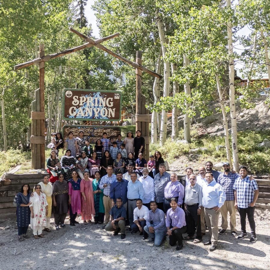 The church family gathered outdoors at Spring Canyon retreat